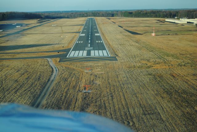 Beechcraft Bonanza (36) (N1116A) - Landing to the north on Runway 2 at KUZA