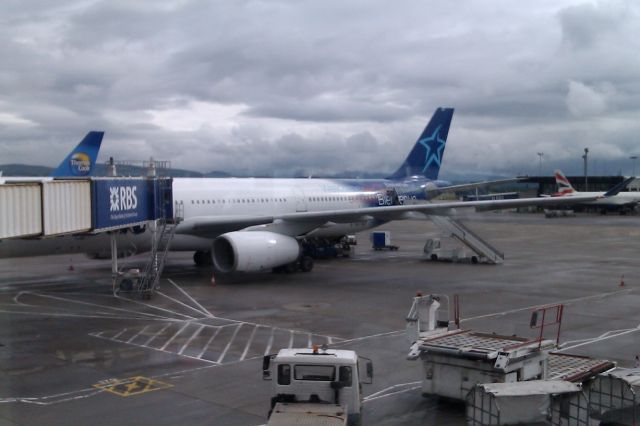 Airbus A330-300 (C-GTSD) - Air Transat flight 199 EGPF to CYYZ loading before boarding and departure.  June 17, 2012.