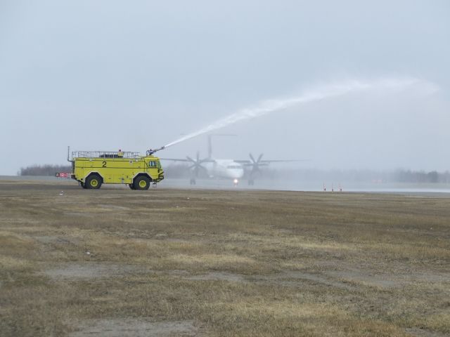 C-GLQE — - Porter Airlines DHC-8 Q400 inaugural flight to CYSB. Greeted by Red 2 and Red 3.