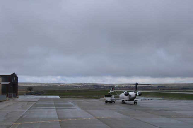 Canadair Regional Jet CRJ-700 (N156GJ) - From the observation deck at KCPR deicing