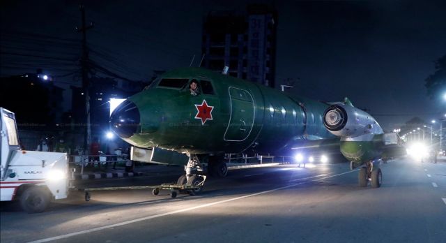 HLI748 — - Nepal army Avro plane being taxied on the busy road. It was grounded for long time and was used by King birendra. It will be showcased in Narayanhiti Museum. 