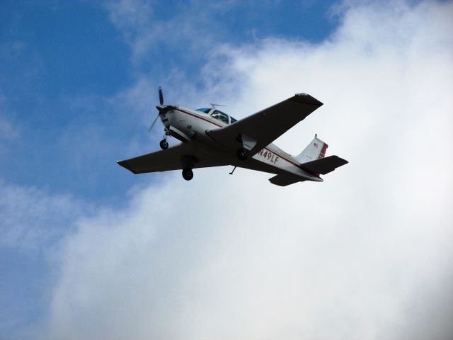 Beechcraft Bonanza (36) (N49LF) - Taking off RWY 26L