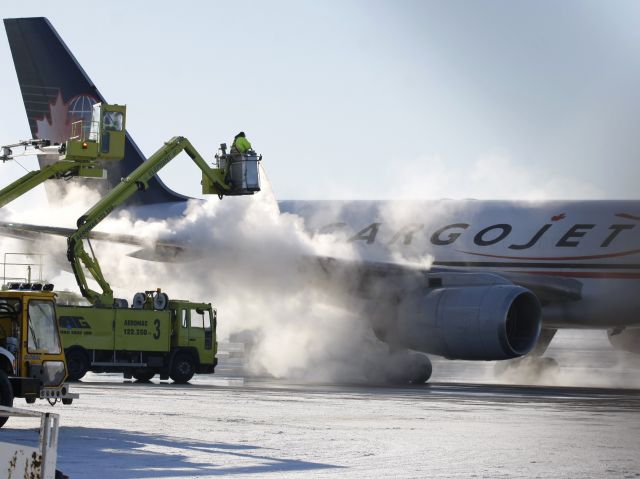 Boeing 757-200 (C-FKCJ) - Jan 17, 2011 - De-icing at -23°C produces some nice effects