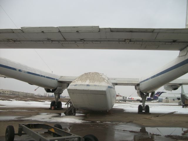 — — - The back "twin tail" of an aircraft I cant identify.