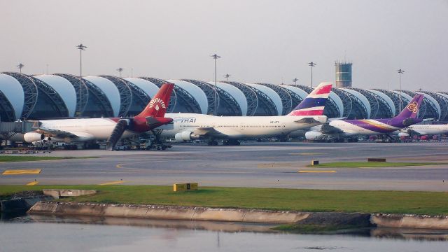 BOEING 747-300 (HS-UTV) - Orient Thai 747-346 HS-UTV next to an Air Madagascar A340-300 and Thai A330-300 at Bangkok (BKK) on Oct 14, 2014. Was great to catch an active pax 747-300 even back in 2014.