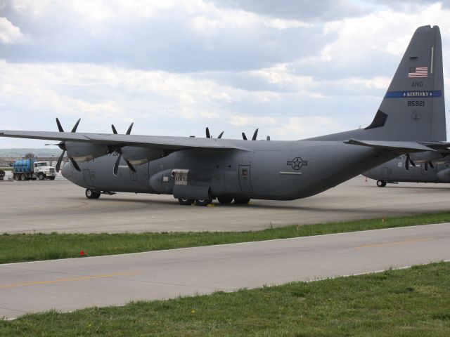 Lockheed C-130 Hercules (N85921) - One of three C-130s near 17L 