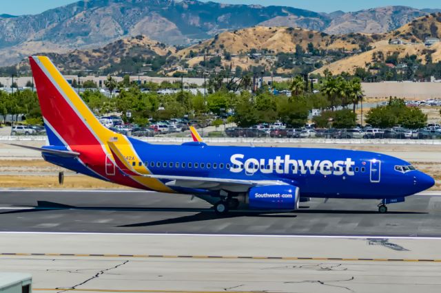 Boeing 737-700 (N7842A) - Southwest might have one of the most colorful liveries out there