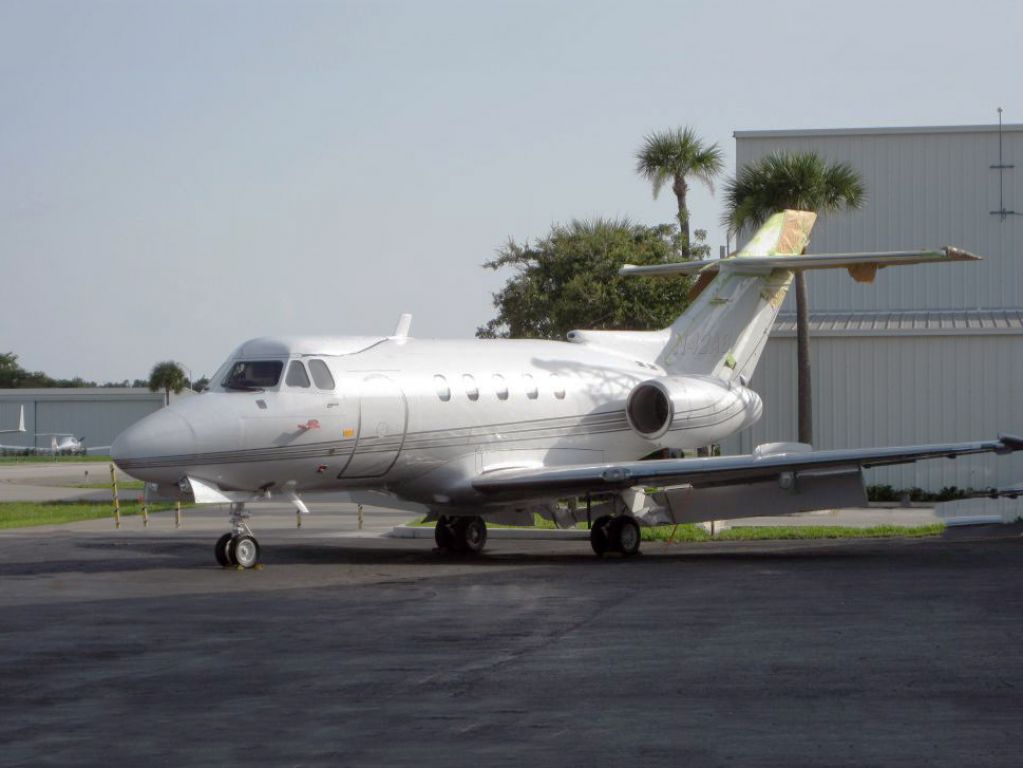 Hawker Siddeley HS-125-400 (N42AS) - A 1968 model Hawker jet retrofitted with Garrett turbofan engines. Almost 2x the range as the old Viper engines. Note the ground flaps full extended. Raw photo courtesy of LEARJETMIAMI - thank you!