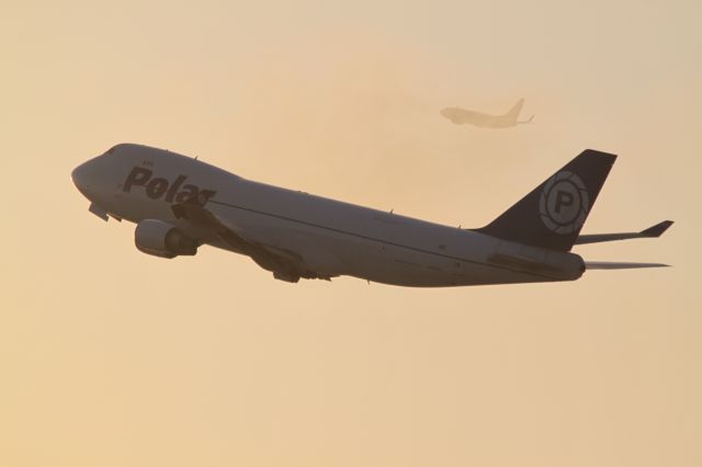 Boeing 747-400 (N454PA) - Pola departed from RWY 25 & departed traffic from RWY 24 in the sunset.