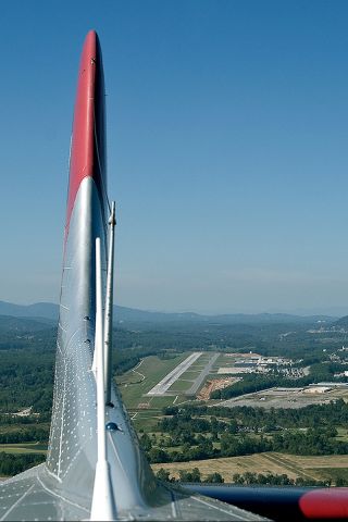 N5017N — - 10/2/2007 Shot from the radio operators emergency hatch after departing from Runway 16.