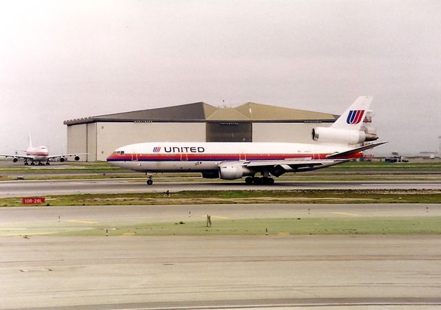 McDonnell Douglas DC-10 (N1857U) - KSFO - UAL workhorse N1857U landing 28 R at SFO. Note the newer larger letters on the newer paint scheme. UAL should have improved on this paint scheme rather than switch to that gawd awful ugly gray paint scheme...it was soooooo ugly.