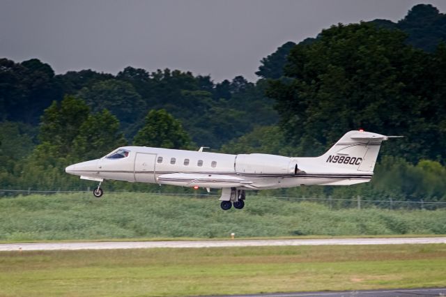 Learjet 35 (N988QC) - departing PDK for homebase