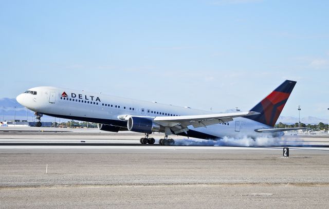 BOEING 767-300 (N137DL) - N137DL Delta Air Lines Boeing 767-332 N137DL (cn 25306/392)  PHOTO 3 One or two second before the tail strike the runway...  Las Vegas - McCarran International (LAS / KLAS) USA - Nevada, August 23, 2012 Photo: Tomás Del Coro