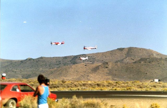 North American P-51 Mustang (N71FT) - scanned from photograph Strega leading Dreadnaught 1980s