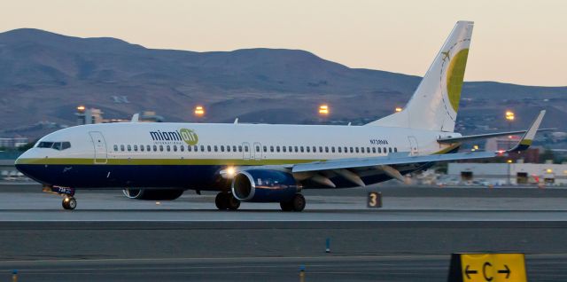 Boeing 737-800 (N738MA) - Being out last Saturday to photo-doc the US Marine activities at KRNO and the troop departure on a UA B744 (see the other picture I posted moments ago) reminded me of similar exercises in previous years. This snap was taken last year when a BSK B738 was at Reno in the dawn light before full sunrise to transport Marines. 