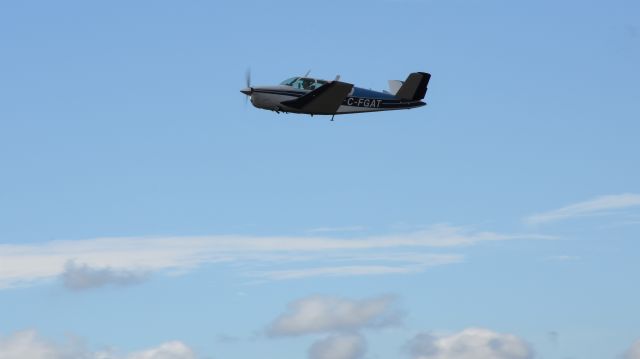 Beechcraft 35 Bonanza (C-FGAT) - Departure after Brantford Air Show.