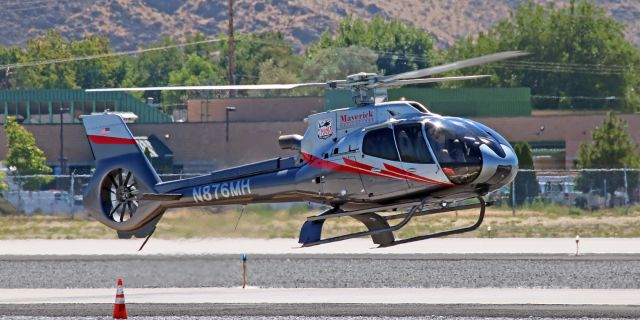 Eurocopter EC-130 (N876MH) - Just returning to RNO after having flown a group of "Burners" out to Black Rock City in the Nevada desert, this Maverick Helicopters EC-130 (N876MH) is about to touch down on Lima taxiway. At the time I was out on Lima taking this photo, I saw four Maverick and two Sundance Eurocopters flying out to 88NV (the temporary Black Rock City Airport) and returning to RNO for more passengers.