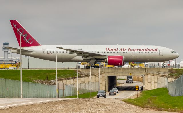 Boeing 777-200 (N828AX) - A rare sight at YYZ is this Omni Air International 777 being leased by Sunwing. Huge uptick for Sunwing as they usually operate 738's. This year (to cover the grounding of 4 MAX8's??) they have leased almost the entire fleet of Eastern 767's and another Omni 767. As spotters, we don't mind at all!