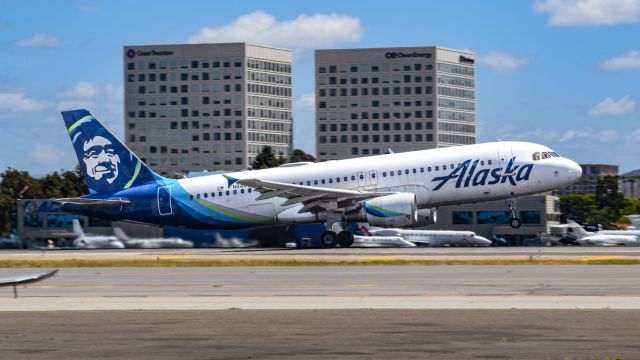 Airbus A320 (N848VA) - Rotating off of 20R bound for KSEA.