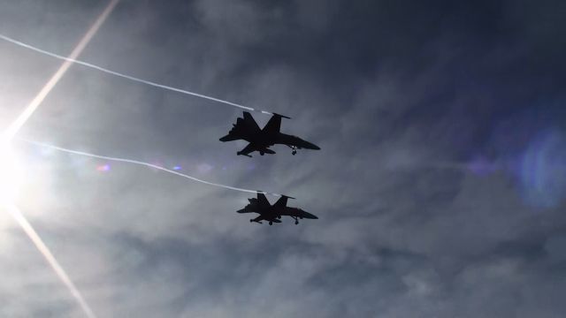 — — - 2 CF-18s with the olympic strike pakage (2 aim-9s, 2 drop tanks, 4 aim-120s