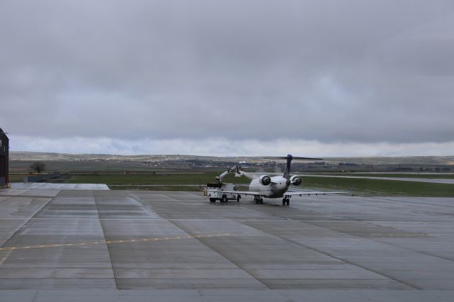 Canadair Regional Jet CRJ-700 (N156GJ) - From the observation deck at KCPR deicing