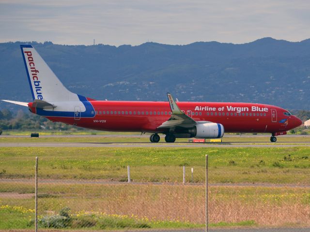 Boeing 737-800 (VH-VOX) - On taxi-way heading for take off on runway 05. Thursday 12th July 2012.