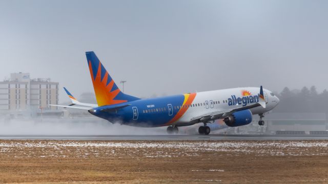 Boeing 737 MAX 8 (N812NV) - Allegiant Air 737-8 MAX blowing water off the runway.