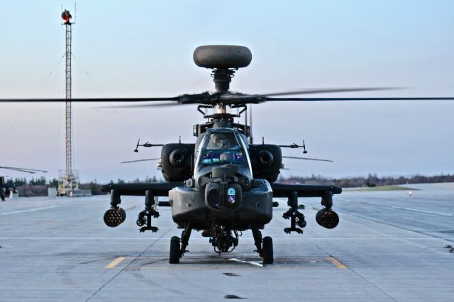 — — - An AH-64D Apache Longbow readies for departure to conduct a training sortie.