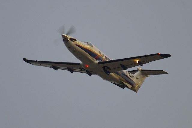 Pilatus PC-12 (N56JW) - Overflying the Embry-Riddle campus after departure from 7L.