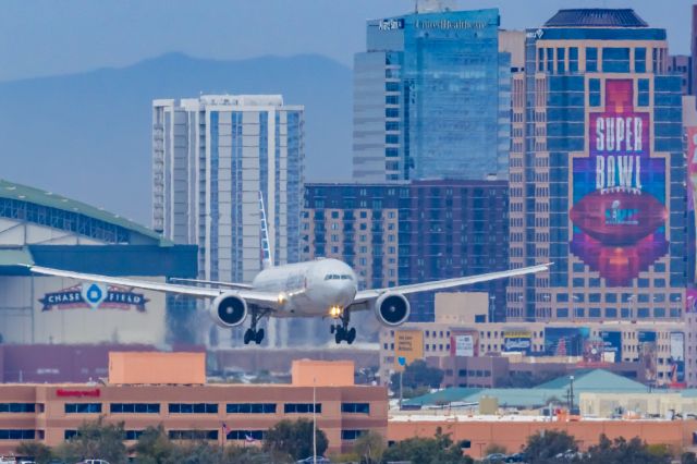 BOEING 777-300ER (N734AR) - An American Airlines 777-300ER landing at PHX on 2/14/23. Taken with a Canon R7 and Canon EF 100-400 II L lens.