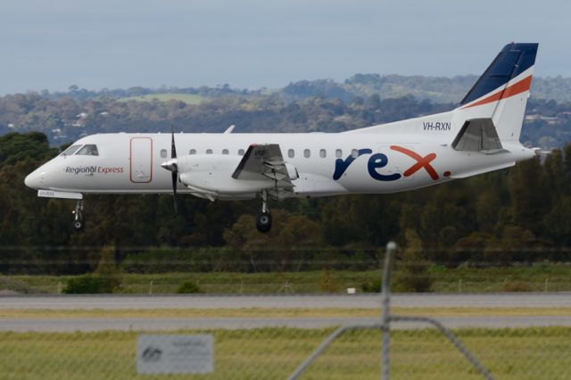 Saab 340 (VH-RXN) - About to put down on runway 05. Thursday 7th August 2014