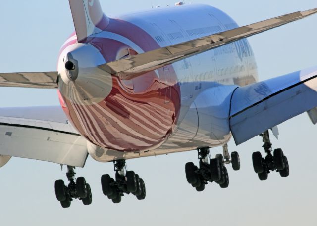 Airbus A380-800 — - Quantas A380 landing at Lax several years ago.  Photo taken from the "park" near the In N out Burger