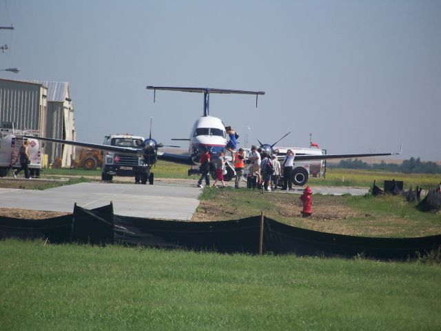 Beechcraft 1900 — - Boarding for their flight to Denver from Hays, KS.