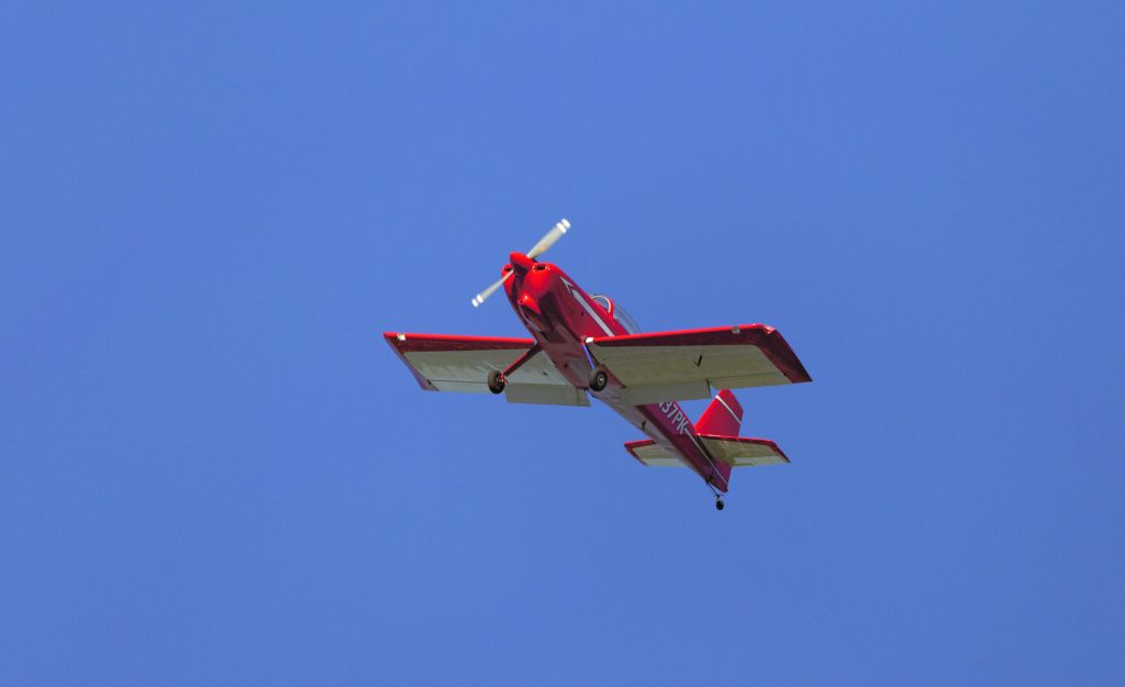 Vans RV-8 (N37PK) - With full flaps and ready to land. Fun looking airplane.