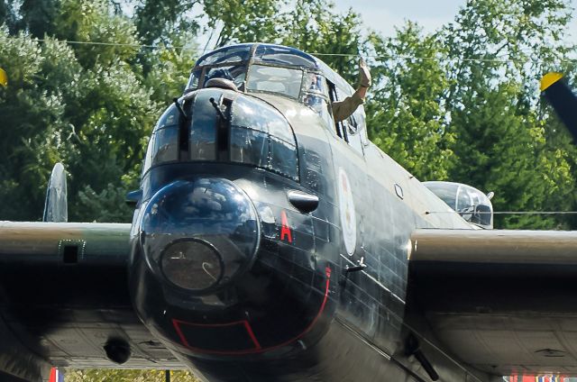 Avro 683 Lancaster (C-GVRA) - Avro Lancaster pilot wave goodbye.