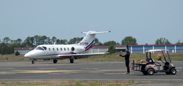 Beechcraft Beechjet (N727KB) - Taxiing for parking is this 1999 Hawker Beechcraft Beechjet 400XP in the Spring of 2023.