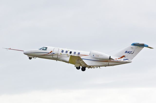 Cessna Citation CJ4 (N4CJ) - One of the first Citation CJ4 aircraft. Static pressure probe and silver tape aft of engine nacelle.  Registration 2008. Departing HIO 8-30-13