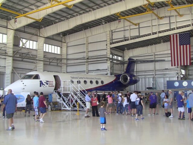 Gulfstream Aerospace Gulfstream V (N677F) - NCAR Research Aviation Facility Aug. 2, 2014 Open House The NSF/NCAR HIAPER is a highly-modified Gulfstream V business jet that has unique capabilities that set it apart from other research aircraft. It can reach 51,000 feet (15,500 meters), enabling scientists to collect data at the tops of storms and the lower edge of the stratosphere. With a range of about 7,000 miles (11,265 kilometers), it can track atmospheric particles across the oceans or reach the South Pole from bases in South America or New Zealand.br /br /Such attributes, plus the ability to carry 5,600 pounds (2,540 kilograms) of state-of-the-art sensors, mean that HIAPER will be on the forefront of scientific discovery. Scientists will be able to probe the upper edges of hurricanes and thunderstorms in unprecedented detail, determining the dynamics that drive these powerful storms. The aircraft enables researchers to study pivotal chemical processes high above Earth that affect global temperatures.