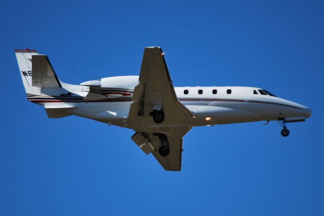 Cessna Citation Excel/XLS (N660QS) - NETJETS SALES INC on final for runway 36R at KCLT - 11/7/14 ... Other owner names include: FIRSTLINE INSURANCE SERVICES INC, HENRY CROWN AND CO, PETERSON AVIATION LLC, STELBAR OIL CORP INC, CALDWELL GROUP LLC, UNITED AUBURN INDIAN COMMUNITY 