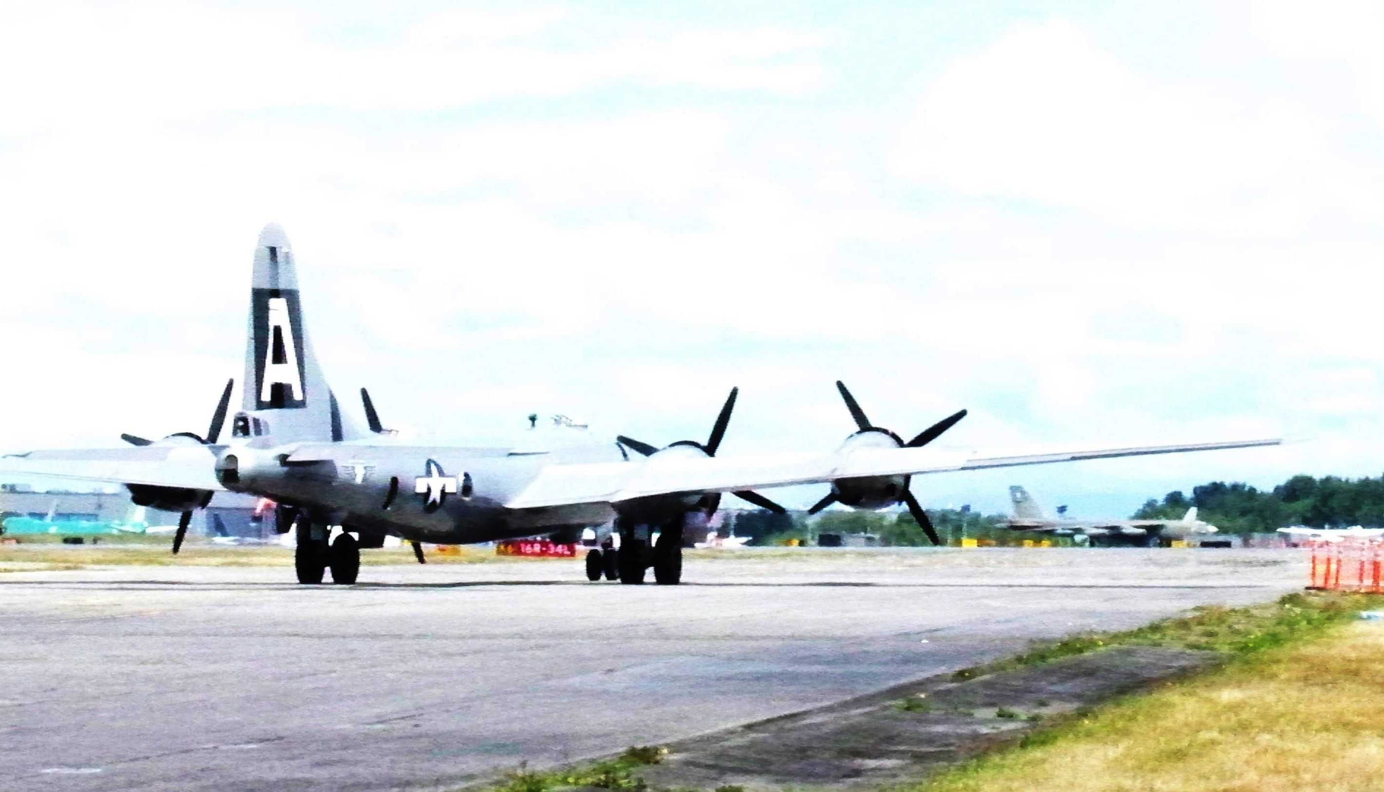 Boeing B-29 Superfortress (N529B) - B-29 FiFi taxiing for take off at Paine Field June20, 2014 with a stationary B-52 across the field. Two Generation Strategic Bombers (FiFi-WWII & B52-ColdWar)