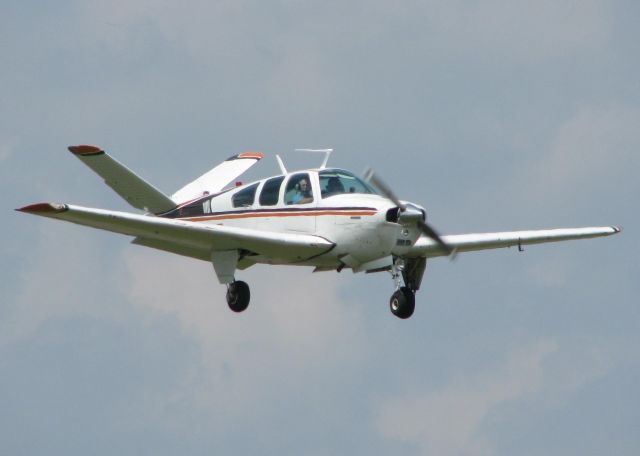 Beechcraft 35 Bonanza (N1XD) - 1961 Beech N35 landing at Downtown Shreveport.