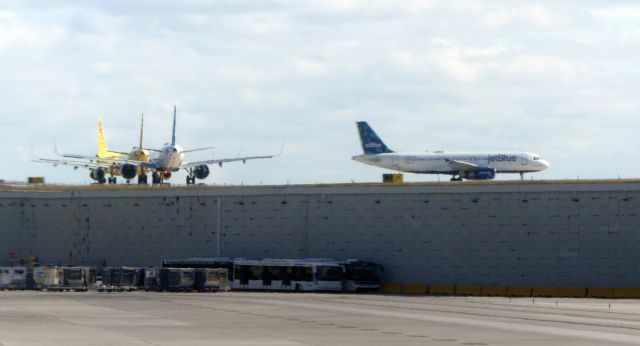 — — - In line for takeoff from Rwy 28L.