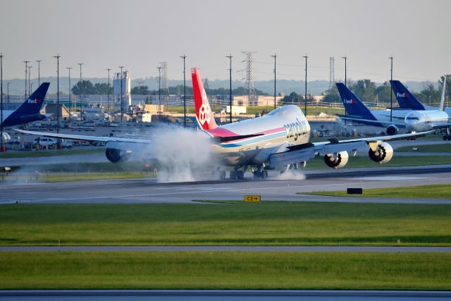 BOEING 747-8 (LX-VCD) - Touchdown 23-L at almost sunset on 05-26-21