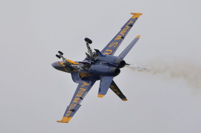 McDonnell Douglas FA-18 Hornet (16-5538) - Blue Angle #5 Lead Solo, Cdr. Thomas Zimmerman, executes a dirty roll on takeoff - California Capital Airshow - 03/22/2025