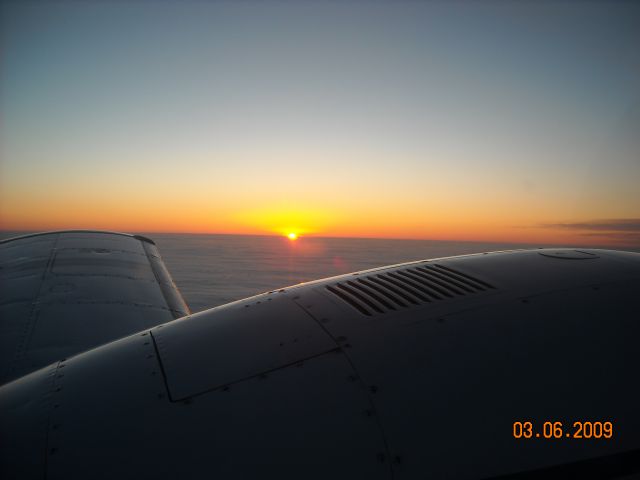 Piper Seneca (N34KG) - Sun coming up over SD.  Enroute to Ft. Worth, TX.