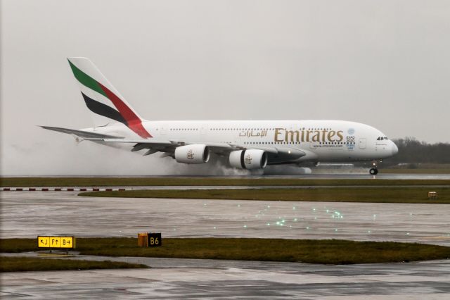 Airbus A380-800 (A6-EOU) - EK21 arrives on a wet day at Manchester, as seen from Terminal 1