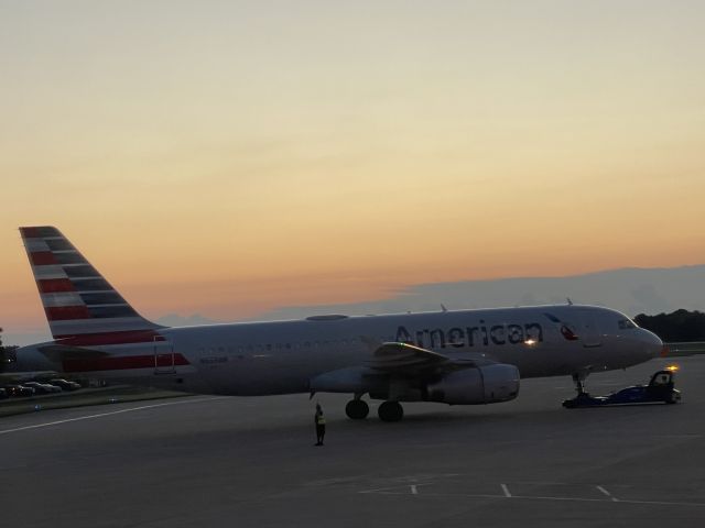 Airbus A320 (N659AW) - Early morning pushback.