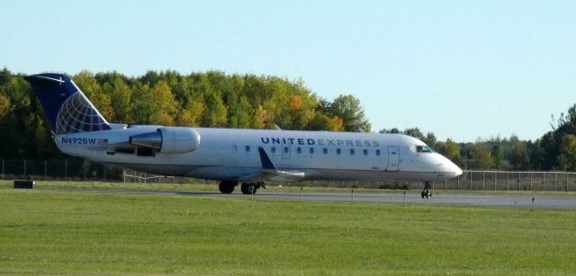 Canadair Regional Jet CRJ-200 (N492SW) - Taxiing for departure is this 1997 United Express Canadair Regional Jet 200LR from late Summer of 2021.