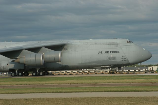 — — - C-5 M on Runway 18 EAA 2009