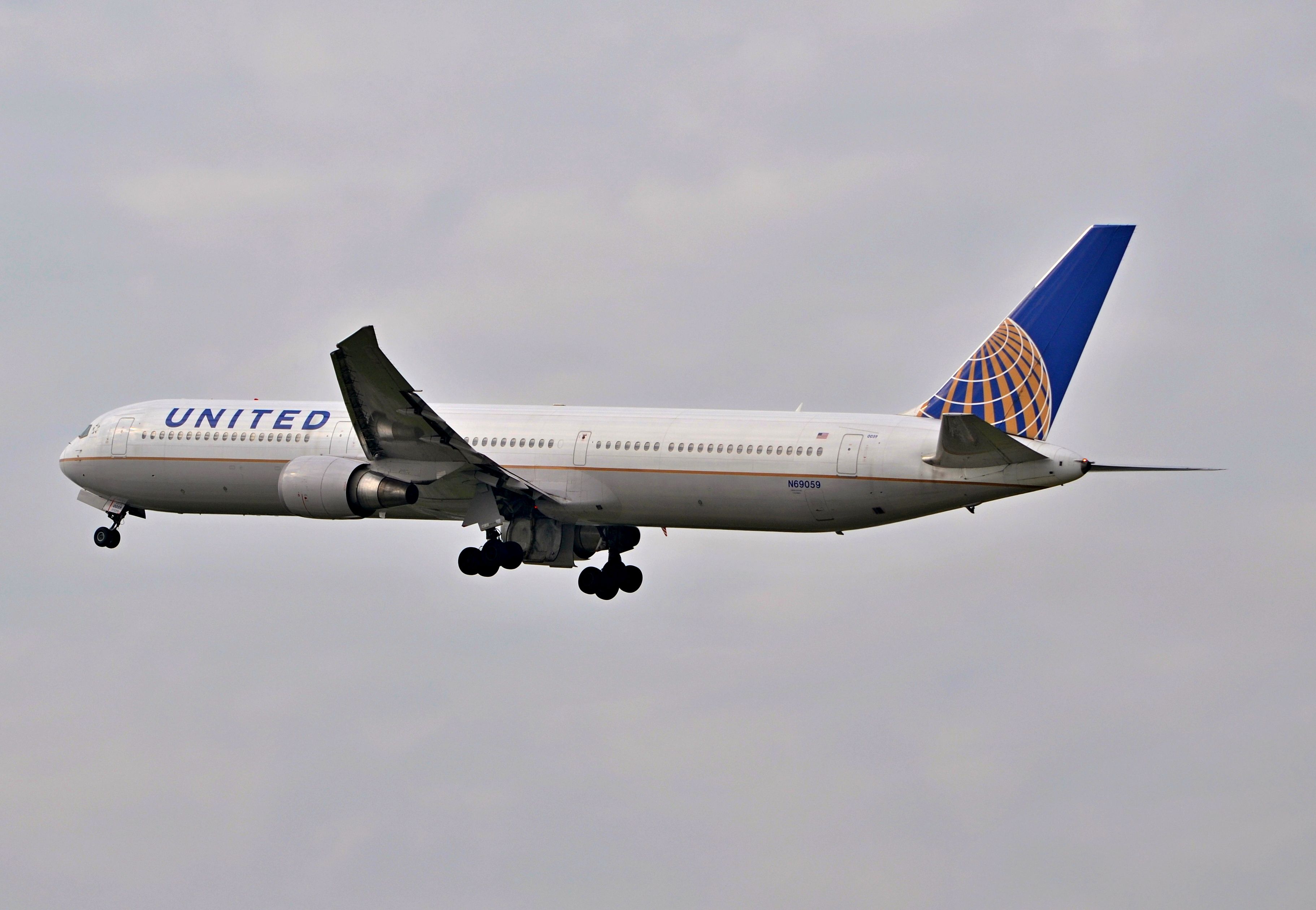 BOEING 767-400 (N69059) - Climbing into the clouds bound for New York - Im also on Instagram: @zuerichplanes